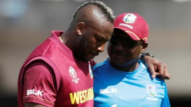 West Indies Andre Russell goes off injured. (Action Images via Reuters)