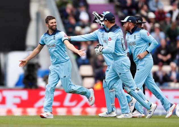 England's Mark Wood celebrates taking the wicket of West Indies Andre Russell. (Action Images via Reuters)