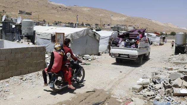 Around 35,000 Syrian refugees are affected by the demolition order, including 15,000 people in the Arsal region, UNHCR says. The order will affect 4,000 structures in the region, municipality head Bassel al-Hujeiri said. “The aim of this decision is to prevent Syrians from staying permanently in Lebanon,” he said. “As the municipality, we are applying the state’s decision.” (Joseph Eid / AFP)