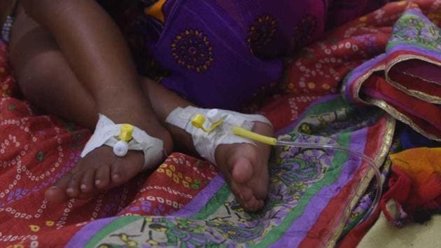 Bihar Health Minister Mangal Pandey on Friday said that as many as 57 children have died due to Acute Encephalitis Syndrome (AES) in Muzaffarpur. “In the last 20-22 days, 57 children have died due to Acute Encephalitis Syndrome (AES),” Pandey said. “We are monitoring all this. The Health Ministry in the state held a meeting on this and decided to make people aware of Acute Encephalitis Syndrome (AES),” the Health Minister shared. (Parwaz Khan / HT File) Bihar Health Minister Mangal Pandey on Friday said that as many as 57 children have died due to Acute Encephalitis Syndrome (AES) in Muzaffarpur. “In the last 20-22 days, 57 children have died due to Acute Encephalitis Syndrome (AES),” Pandey said. “We are monitoring all this. The Health Ministry in the state held a meeting on this and decided to make people aware of Acute Encephalitis Syndrome (AES),” the Health Minister shared. (Parwaz Khan / HT File)