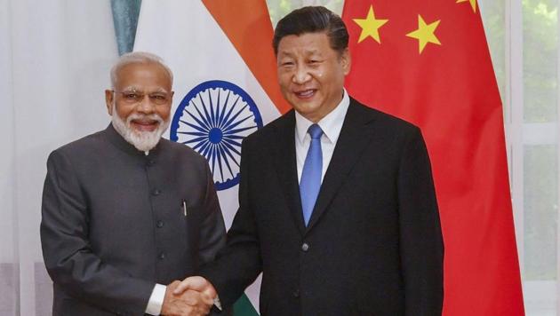 Prime Minister Narendra Modi shakes hands with Chinese President Xi Jinping on the sidelines of the Shanghai Cooperation Organisation (SCO) Summit in Bishkek, Kyrgyzstan.(PTI File Photo)