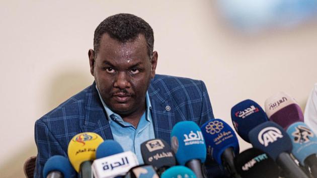 Sudanese protest leader Madani Abbas Madani delivers a speech during a press conference in Khartoum, Sudan after ending the civil disobedience campaign and agreeing to hold talks with the country’s ruling army generals following a mediation by Ethiopian Prime Minister Abiy Ahmed. (AFP)
