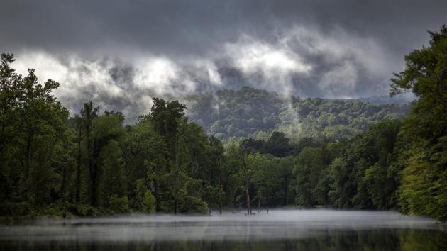 Morning clouds clear out as sunlight breaks through on the ridges above the Holston River in Sullivan County Tennessee, in Bristol, England. (Andre Teague, Bristol Herald Courier / AP)