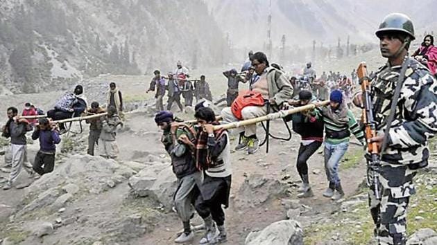 Pilgrims on their way to Amarnath cave near Dhumal, 120km northeast of Srinagar.(HT File Photo) Pilgrims on their way to Amarnath cave near Dhumal, 120km northeast of Srinagar.(HT File Photo)