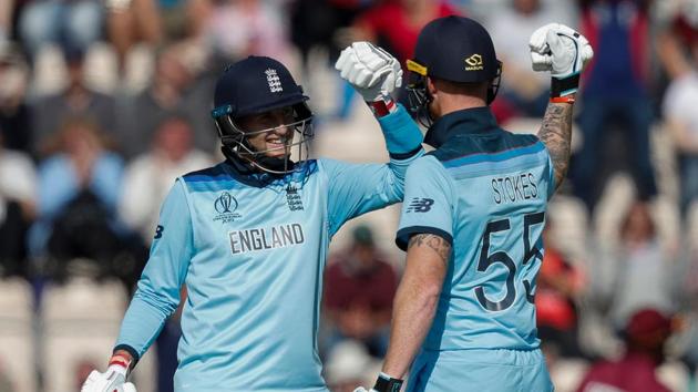 England's Joe Root (L) and England's Ben Stokes celebrate after victory in the 2019 Cricket World Cup(AFP)