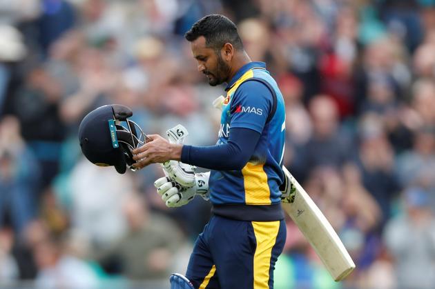 Sri Lanka's Dimuth Karunaratne looks dejected as he walks off the pitch after being caught out by Glenn Maxwell. (Action Images via Reuters)