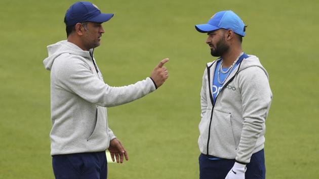 India's MS Dhoni, left, speaks to Rishabh Pant during a training session. (AP) India's MS Dhoni, left, speaks to Rishabh Pant during a training session. (AP)