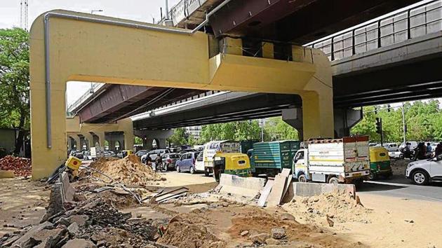 Construction material beneath the newly constructed RTR flyover, parallel to the existing one.(Vipin Kumar/HT PHOTO)