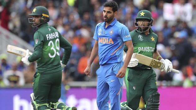 India's Bhuvneshwar Kumar, center, reacts as Pakistan's Imam-ul-Haq, right, and Fakhar Zaman run between the wickets. (AP) India's Bhuvneshwar Kumar, center, reacts as Pakistan's Imam-ul-Haq, right, and Fakhar Zaman run between the wickets. (AP)
