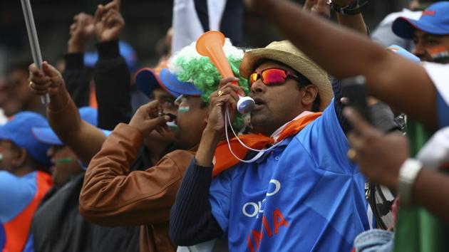 Indian fans cheer for their team before the start of the Cricket World Cup match between India and Pakistan. (AP) Indian fans cheer for their team before the start of the Cricket World Cup match between India and Pakistan. (AP)