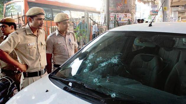 The car in which a gangster was gunned down by his rivals in Dwarka Mor on May 19.(HT Photo)