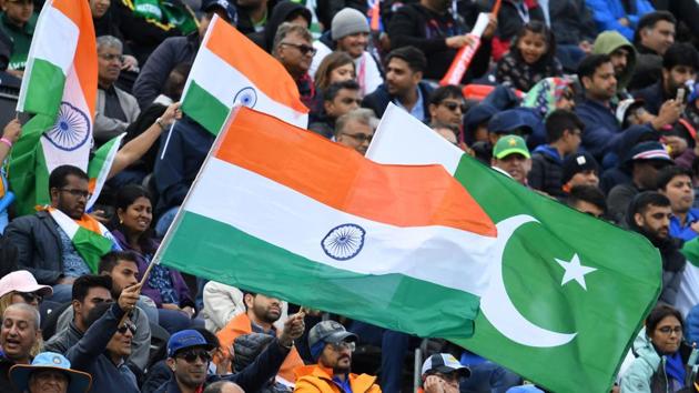Spectators wave flags during the 2019 Cricket World Cup group stage match between India and Pakistan. (AFP)
