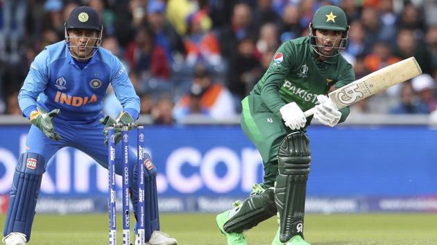 Pakistan's Fakhar Zaman, right, bats during the Cricket World Cup match between India and Pakistan at Old Trafford. (AP)
