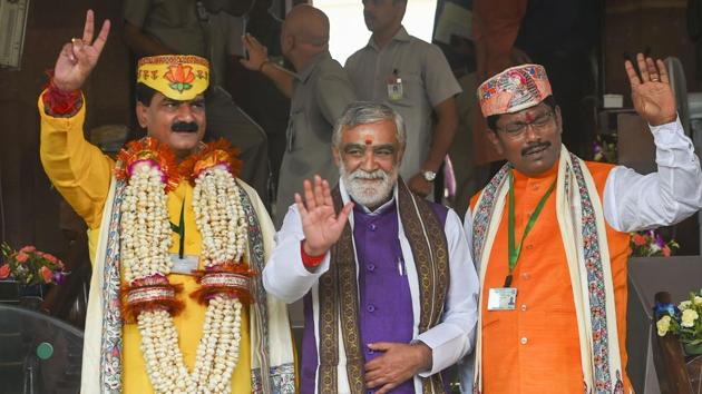 BJP MP's Gopal Jee Thakur and Ashok Kumar Yadav with Minister of State in the Ministry of Health and Family Welfare Ashwini Kumar Choubey arrive for the first session of the 17th Lok Sabha at Parliament House in New Delhi.(PTI Photo)