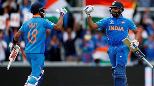 India's Rohit Sharma celebrates his century with Virat Kohli. (Action Images via Reuters)