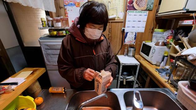 Other residents say the policy is just common sense. “I understand it’s convenient to just burn waste,” said 71-year-old local Saeko Takahashi, as she washed milk cartons and tied newspapers together. “It’s better to recycle, it’s such a waste otherwise,” she explained. (Kazuhiro Nogi / AFP) 