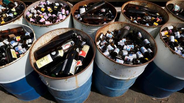 Bottles separated into drums at the waste centre in Kamikatsu. The categories cover everything from pillows to toothbrushes as the town aims to recycle all its waste, sending nothing to incinerators, by next year. The process can be onerous -- not only are there dozens of separate categories, but items like plastic bags and bottles must be washed and dried to facilitate recycling. (Kazuhiro Nogi / AFP) 
