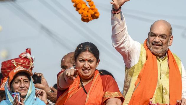 BJP National President Amit Shah during a roadshow in support of party's candidate from Amethi seat Smriti Irani for Lok Sabha polls, in Amethi, Saturday, May 4, 2019. (PTI file photo) BJP National President Amit Shah during a roadshow in support of party's candidate from Amethi seat Smriti Irani for Lok Sabha polls, in Amethi, Saturday, May 4, 2019. (PTI file photo)