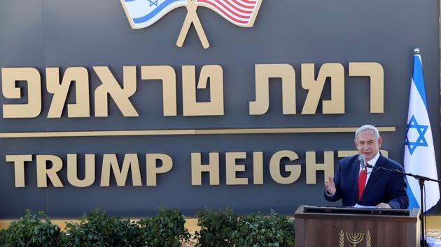 Israeli Prime Minister Benjamin Netanyahu speaks during a ceremony to unveil a sign for a new community named after U.S. President Donald Trump, in the Israeli-occupied Golan Heights.(REUTERS)