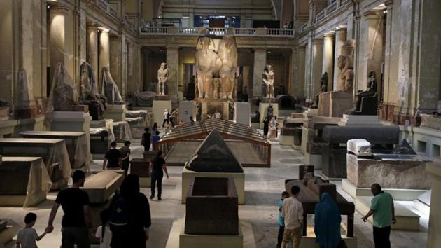 Tourists look at artefacts inside the Egyptian Museum in Cairo. (REUTERS) Tourists look at artefacts inside the Egyptian Museum in Cairo. (REUTERS)
