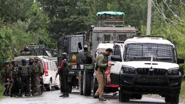 Army personnel cordon off the area after an IED blast in Pulwama on Monday. (ANI) Army personnel cordon off the area after an IED blast in Pulwama on Monday. (ANI)