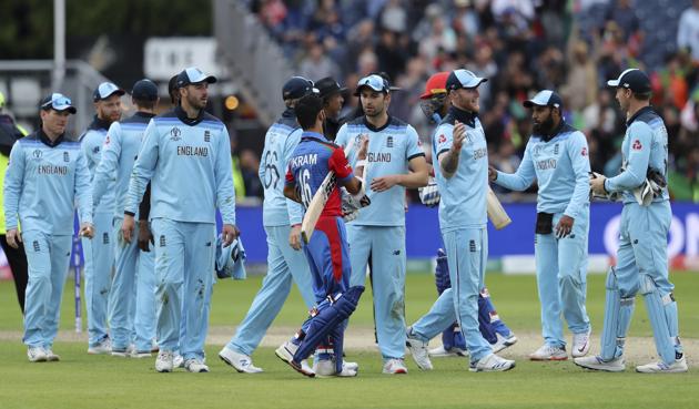 England players celebrate their win in the Cricket World Cup match. (AP)