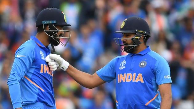 India's Rohit Sharma (R) congratulates India's K.L. Rahul after scoring a half-century (50 runs) during the 2019 Cricket World Cup group stage match between India and Pakistan.(AFP)