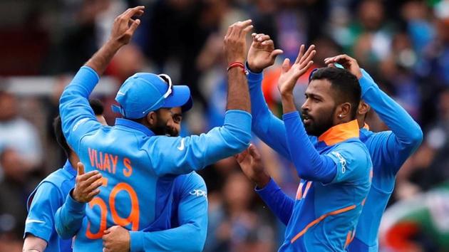 India's players celebrate the wicket of Pakistan's Mohammad Hafeez.(Action Images via Reuters) India's players celebrate the wicket of Pakistan's Mohammad Hafeez.(Action Images via Reuters)