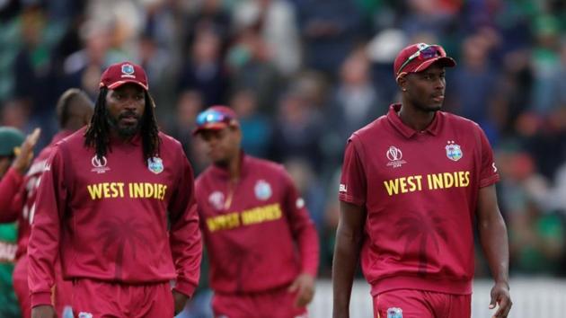 West Indies' Chris Gayle and Jason Holder look dejected at the end of the match(Action Images via Reuters)