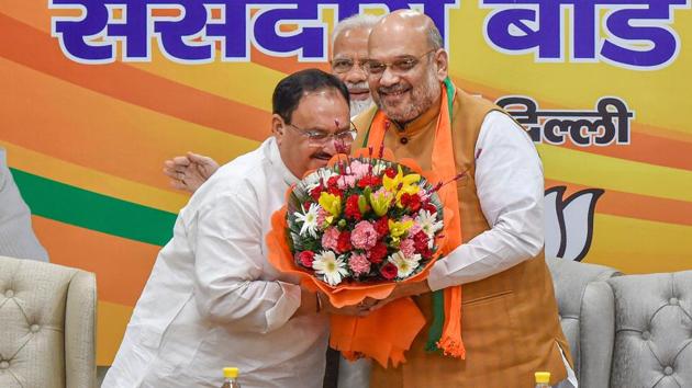 BJP President and Home Minister Amit Shah gives a bouquet to JP Nadda after he was appointed as the BJP’s working president during BJP parliamentary board meeting, New Delhi, June 17 (PTI) BJP President and Home Minister Amit Shah gives a bouquet to JP Nadda after he was appointed as the BJP’s working president during BJP parliamentary board meeting, New Delhi, June 17 (PTI)