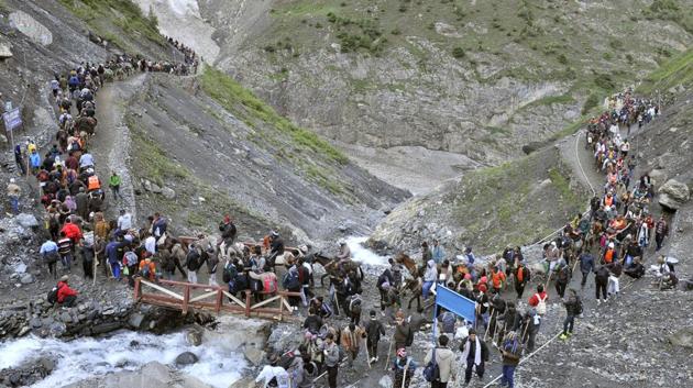 Three-tier security arrangements are being made for the two-month-long annual pilgrimage to Amarnath cave shrine in Kashmir’s militancy-hit Anantnag district, officials aware of the development said on Monday. “Apart from the Jammu and Kashmir police, CRPF (Central Reserve Police Force), Army, BSF (Border Security Force) and SSB (Sashastra Seema Bal) will also be deployed,’’ an officer said on condition of anonymity. (Waseem Andrabi / HT Archive)