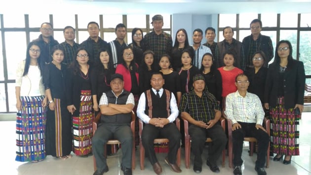Mizoram government officials in traditional dress after a government circular asking them to wear traditional dresses to office voluntarily at least once a week.(HT PHOTO)
