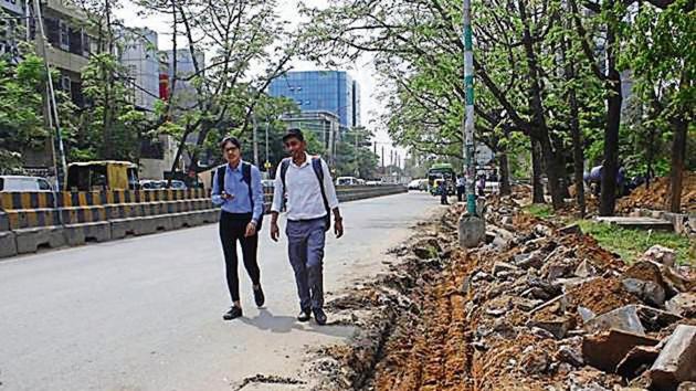 Even five months after the groundbreaking ceremony for widening and re-carpeting three roads in Udyog Vihar was done, there has hardly been any progress in the work on the ground, said factory owners on Wednesday.(Yogendra Kumar/HT PHOTOs)