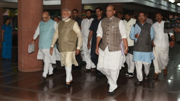 PM Modi, defence minister Rajnath Singh and union home minister Amit Shah leaving the Parliament house after all-party meet on Wednesday.(Sonu Mehta/ HT photo)