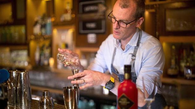 A barman prepares a cocktail with Baijiu Chinese spirit at a bar in central London. Boyce advocates creative cocktails or novelties like baijiu ice cream, suggestions that provoke blank stares from Chinese baijiu executives seeking his advice. “It’s been frustrating, frankly,” he added. (Tolga Akmen / AFP) A barman prepares a cocktail with Baijiu Chinese spirit at a bar in central London. Boyce advocates creative cocktails or novelties like baijiu ice cream, suggestions that provoke blank stares from Chinese baijiu executives seeking his advice. “It’s been frustrating, frankly,” he added. (Tolga Akmen / AFP)