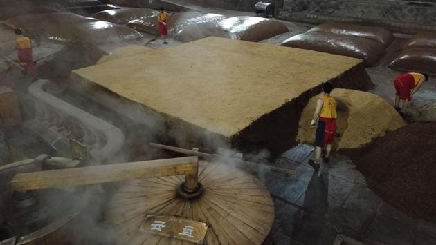 Workers prepare and distill grain. “The foreign view of baijiu is: very spicy, like a rocket blasting to heaven,” Su told AFP. Around 10.8 billion litres of baijiu was consumed last year, nearly all in China, according to International Wine and Spirit Research. That’s more than whisky, vodka, gin, rum and tequila combined and would take an hour to slosh over Niagara Falls according to WorldBaijiuDay.com. (Hector Retamal / AFP) Workers prepare and distill grain. “The foreign view of baijiu is: very spicy, like a rocket blasting to heaven,” Su told AFP. Around 10.8 billion litres of baijiu was consumed last year, nearly all in China, according to International Wine and Spirit Research. That’s more than whisky, vodka, gin, rum and tequila combined and would take an hour to slosh over Niagara Falls according to WorldBaijiuDay.com. (Hector Retamal / AFP)