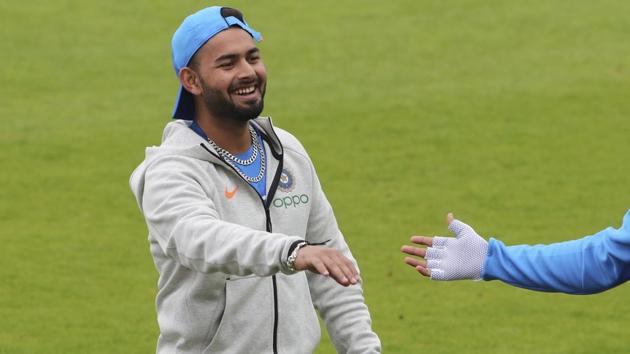 India's Rishabh Pant shares a light moment with a teammate during a training session(AP)