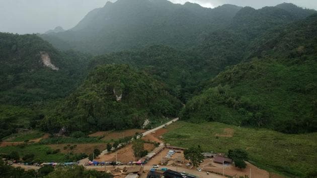 There has been extraordinary global interest in the picturesque rural backwater of Mae Sai since 12 youngsters -- aged between 11 and 16 -- and their coach entered the Tham Luang cave on June 23, 2018. They quickly became trapped by rising water levels and the daring, unprecedented mission to extract them through twisting flooded passageways captivated the world for 18 nail-biting days. (Lilian Suwanrumpha / AFP)
