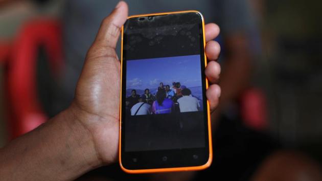 On Thursday, May 16, a friend of Luis’s, Raymond Acosta took the voyagers to a taxi stand, where they said their goodbyes. Before they boarded, Bastardo snapped a photo of Katerin, Dylan and Victoria with their backs to the camera, staring out to sea. She sent it to her family.The plan was to arrive at the Trinidadian port of Chaguaramas under cover of darkness. The journey from Guiria typically takes about four hours. (Ivan Alvarado / REUTERS) On Thursday, May 16, a friend of Luis’s, Raymond Acosta took the voyagers to a taxi stand, where they said their goodbyes. Before they boarded, Bastardo snapped a photo of Katerin, Dylan and Victoria with their backs to the camera, staring out to sea. She sent it to her family.The plan was to arrive at the Trinidadian port of Chaguaramas under cover of darkness. The journey from Guiria typically takes about four hours. (Ivan Alvarado / REUTERS)
