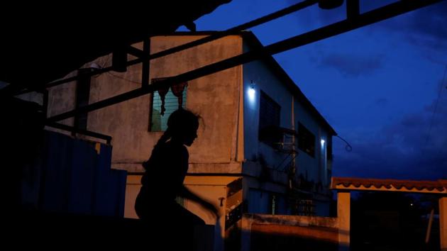 Maroly Bastardo’s nine-year-old sibling, Aranza, plays outside their house. “It just causes me more agony: Is it her? Is it not her?” Carolina said from her porch in El Tigre, staring into the distance. Aranza, says she believes her big sister is still alive. The child’s birthday is coming up June 30. She tells her mom the only present she wants is to have Bastardo and the others back. (Ivan Alvarado / REUTERS) Maroly Bastardo’s nine-year-old sibling, Aranza, plays outside their house. “It just causes me more agony: Is it her? Is it not her?” Carolina said from her porch in El Tigre, staring into the distance. Aranza, says she believes her big sister is still alive. The child’s birthday is coming up June 30. She tells her mom the only present she wants is to have Bastardo and the others back. (Ivan Alvarado / REUTERS)