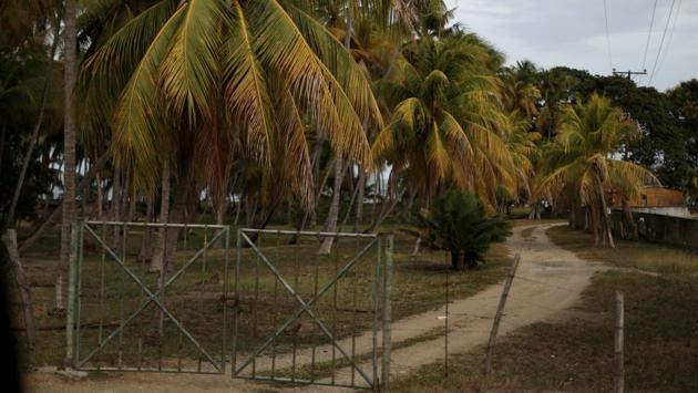 A view of a trail taken by migrants, among them Maroly Bastardo and her children. A man believed to be the boat’s pilot, 25-year-old Venezuelan named Alberto Abreu, was plucked from the sea on May 17 by a fisherman and taken to nearby Grenada. Abreu told his rescuer the Ana Maria had sunk the night before. He fled before police could complete their investigation, Grenadian authorities said, and hasn’t been spotted since. (Ivan Alvarado / REUTERS) A view of a trail taken by migrants, among them Maroly Bastardo and her children. A man believed to be the boat’s pilot, 25-year-old Venezuelan named Alberto Abreu, was plucked from the sea on May 17 by a fisherman and taken to nearby Grenada. Abreu told his rescuer the Ana Maria had sunk the night before. He fled before police could complete their investigation, Grenadian authorities said, and hasn’t been spotted since. (Ivan Alvarado / REUTERS)