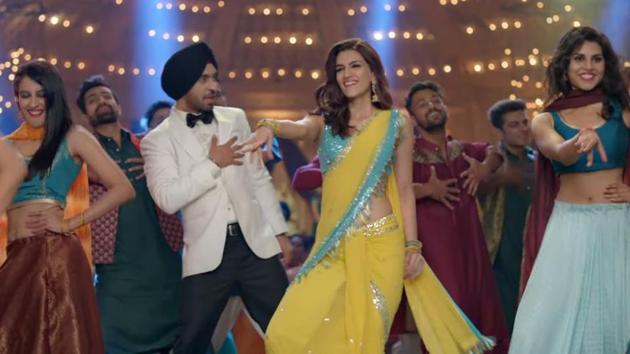 Diljit Dosanjh, Kriti Sanon in a still from the Arjun Patiala trailer.