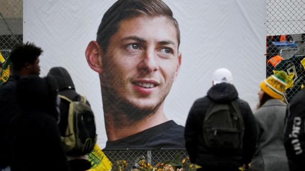 FILE PHOTO: General view of fans looking at tributes left outside the stadium in memory of Emiliano Sala. (REUTERS) FILE PHOTO: General view of fans looking at tributes left outside the stadium in memory of Emiliano Sala. (REUTERS)