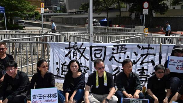 Hong Kong’s reputation as a stable financial hub has been shaken by a controversial extradition bill that prompted massive protests, and its loss might just be Singapore’s gain, experts say.(AFP File Photo)