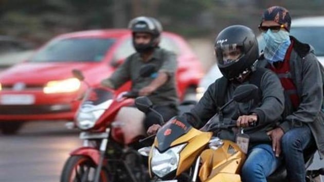 The Delhi government Thursday notified the amendments to the Delhi Motor Vehicles Rules, 1993, which has made two-wheelers eligible for fancy numberplates through e-auction.(HT Photo)