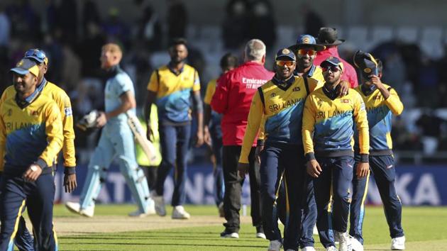 Sri Lankan cricketers celebrate after winning the Cricket World Cup match against England. (AP)