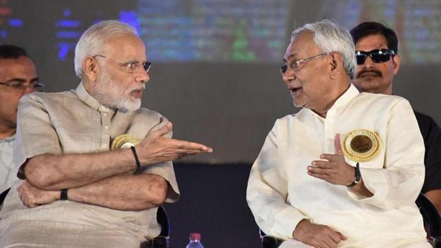 PM Modi with Bihar CM Nitish Kumar during 'Satyagrah Se Swachhagrah' programme in Motihari in Bihar. JD (U)’s stance doesn’t pose a threat to the passing of the bill in Lok Sabha since the BJP has majority on its own but it will have an impact in the Rajya Sabha(PTI file photo)