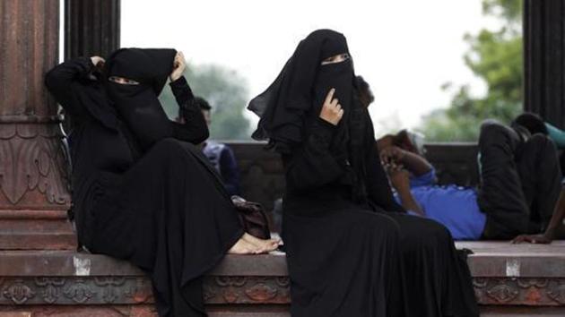 Indian Muslim women rest inside Jama Masjid mosque in New Delhi.(AP file photo)