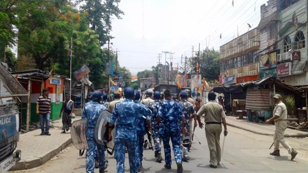 Paramilitary personnel march as a clash broke out between two groups in Bhatpara on Thursday. (ANI Photo) Paramilitary personnel march as a clash broke out between two groups in Bhatpara on Thursday. (ANI Photo)