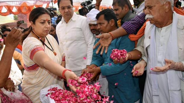 BJP MP Smriti Irani visited her parliamentary constituency Amethi on May 25 after her aide and former village head (pradhan) Surendra Singh was killed. (PTI File) BJP MP Smriti Irani visited her parliamentary constituency Amethi on May 25 after her aide and former village head (pradhan) Surendra Singh was killed. (PTI File)